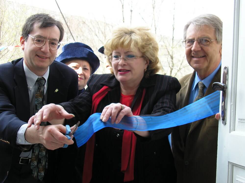  Ribbon cutting ceremony for the heating and hot water system. 
